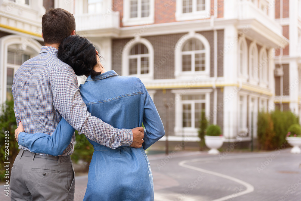 Man and woman hugging outdoors Man and woman hugging outdoors