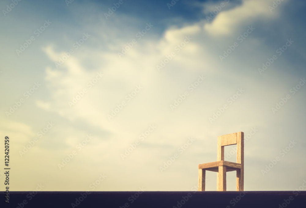 single chair with beautiful sky on dawn time