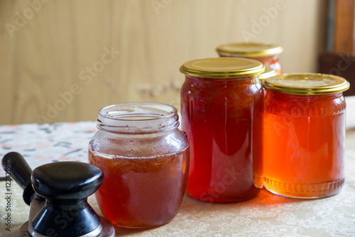 Glass jars with homemade apple jam
