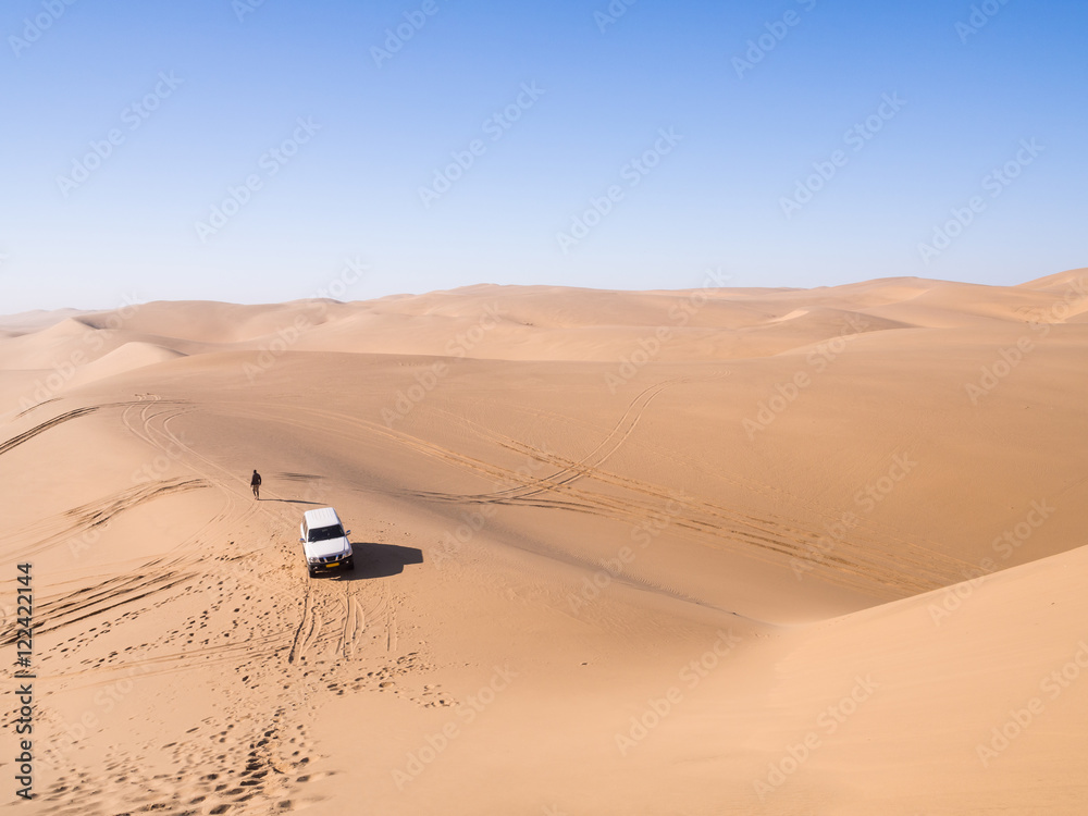 Car on the Namib Desert in Sandwich Harbour, Namibia