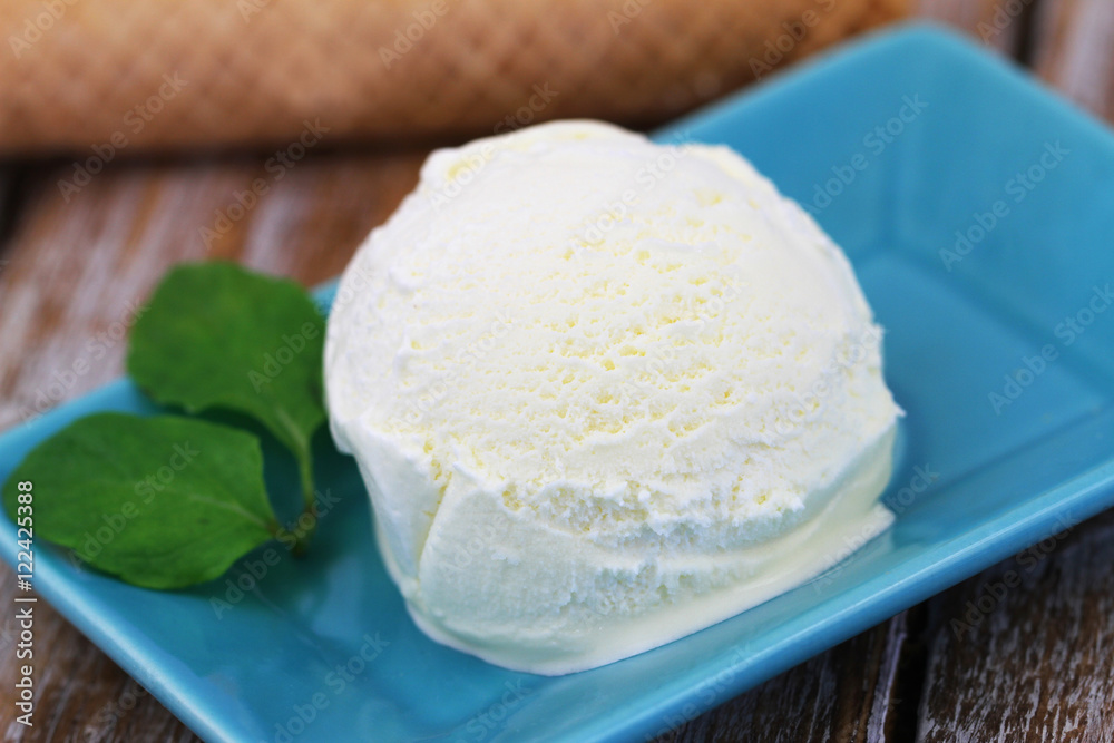 Scoop of creamy vanilla ice cream with crispy wafer
Scoop of creamy vanilla ice cream with crispy wafer