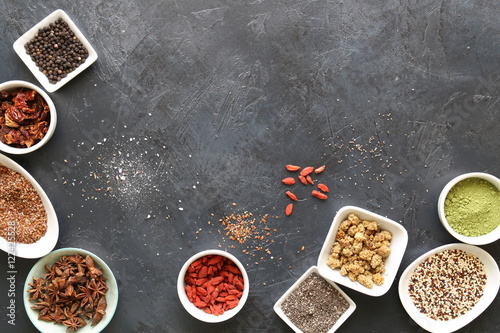 Super Food in bowls on dark ground