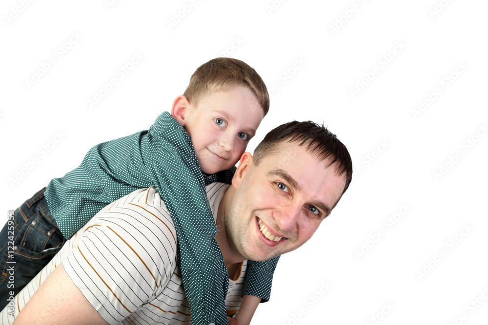 Man with teenage boy on back happy smiles isolated on white background Man with teenage boy on back happy smiles isolated on white background