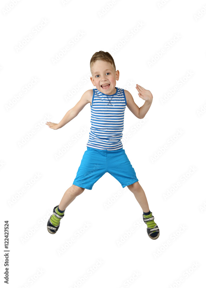Merry little boy in shorts and shirt jumps isolated on white background Merry little boy in shorts and shirt jumps isolated on white background