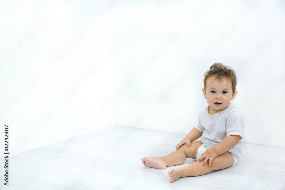 Adorable baby boy sitting on the floor, close up, Asian, black eyes, hairstyle Adorable baby boy sitting on the floor, close up, Asian, black eyes, hairstyle