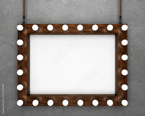 Wooden frame on concrete background illuminated by light bulbs. 3D rendering © belov1409