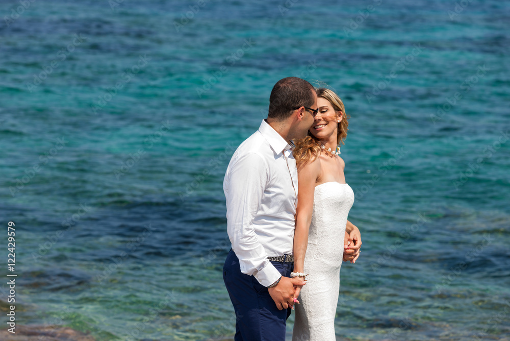 Young couple at the sea