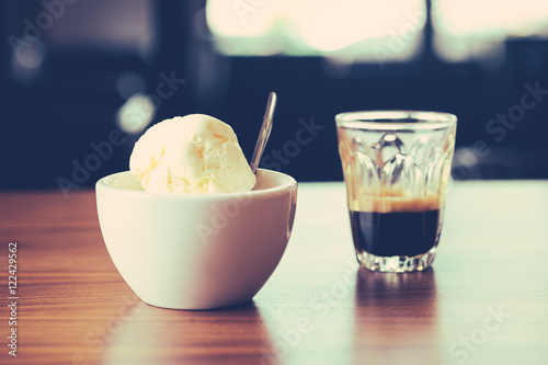 Affogato coffee, espresso shot with vanilla ice cream, backgroun