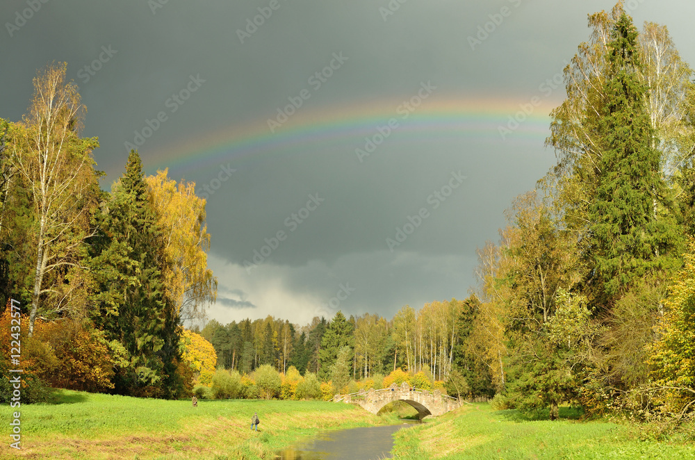 The rainbow in the sky after the rain.