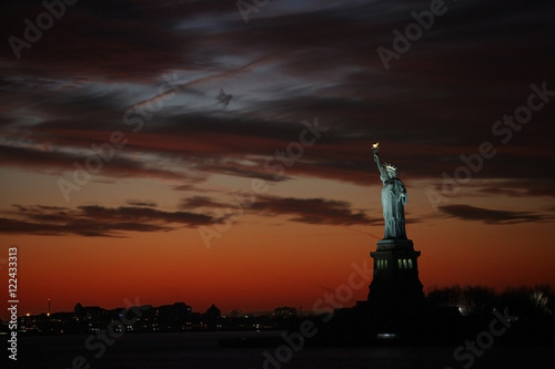 The Statue of Liberty on a Dramatic Sunset Red Sky