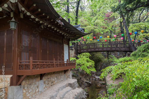 Gilsangheon - a wooden building, living quarters for master sunim (senior monks) and a bridge at the Gilsangsa Temple in Seoul, South Korea. photo