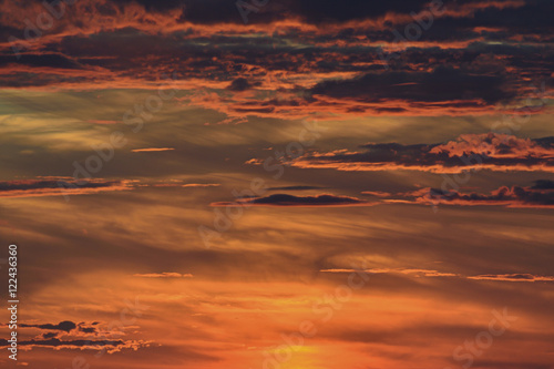 bright red sky with clouds at sunset photo