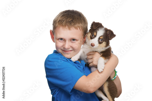 Happy Boy Holding Puppy