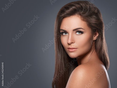 Beautiful and young woman with a artificial eyelashes