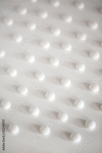 White pills abstract composition