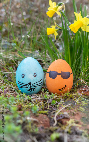 funny Easter eggs / blue and orange Easter egg with funny faces 