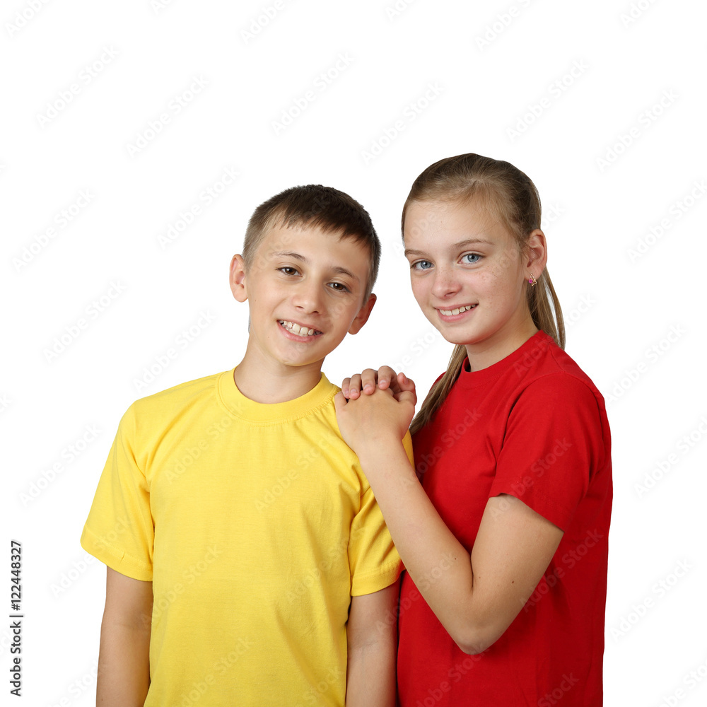 Teenage boy and girl in yellow and red t-shirts stand together isolated on white background in square Teenage boy and girl in yellow and red t-shirts stand together isolated on white background in square