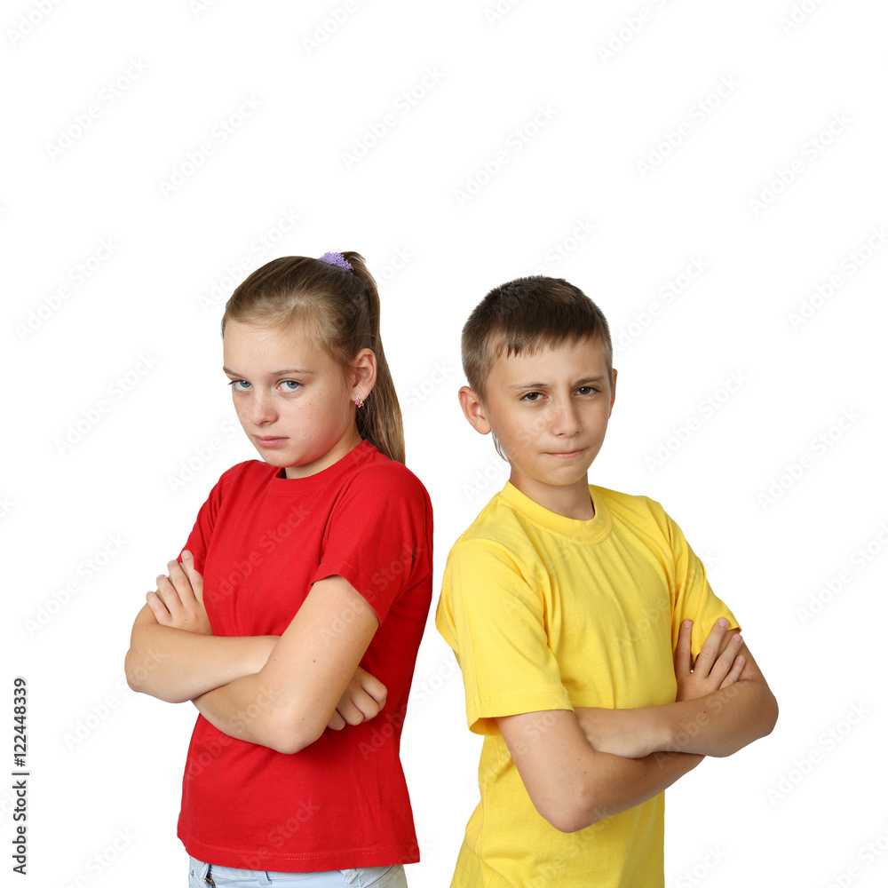 Quarreled - teenage boy and girl in yellow and red t-shirts stand with gloomy faces and arms folded isolated on white background in square Quarreled - teenage boy and girl in yellow and red t-shirts stand with gloomy faces and arms folded isolated on white background in square