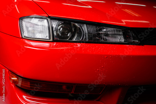 Car detailing series : Wet red car © bhakpong
