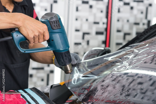 Картината върху платно Car window tinting series : Heat shrinking window film