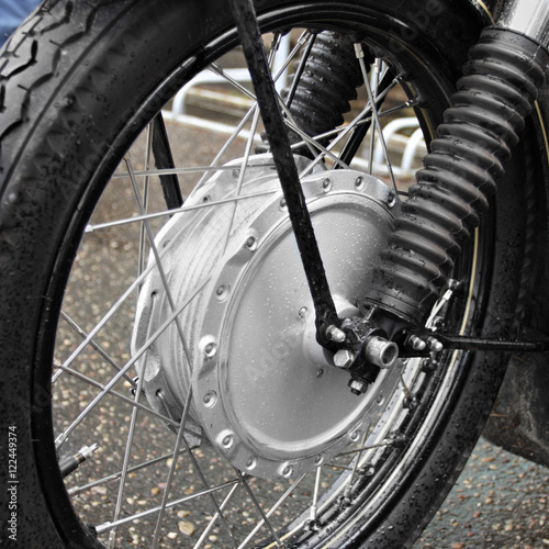 Motorcycle wheel with rain drops closeup