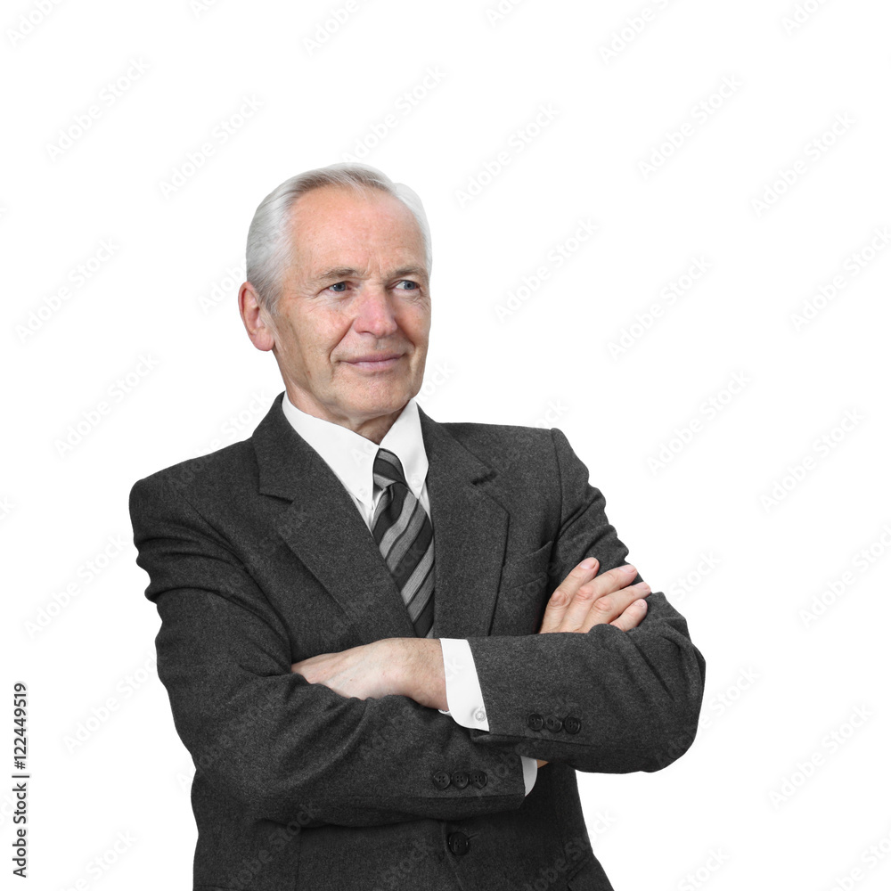 Senior man stands seriously with arms folded isolated on white background Senior man stands seriously with arms folded isolated on white background