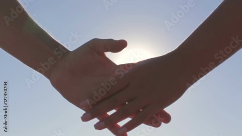 Couple on a date holding hands solar flare