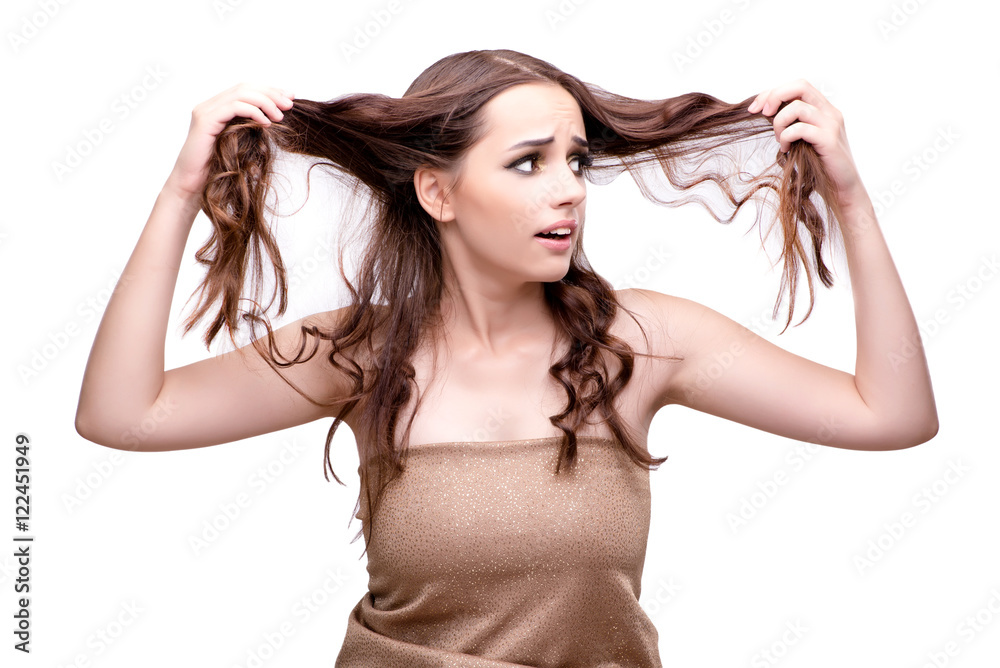 Obraz premium Woman checking her haircut isolated on white
