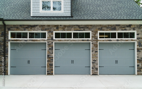 Fototapeta Residential house car garage doors