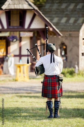 Canvas Print Lone Bagpiper Playing