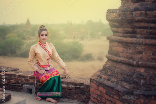 Beautiful girl in Myanmar traditional costume, identity culture