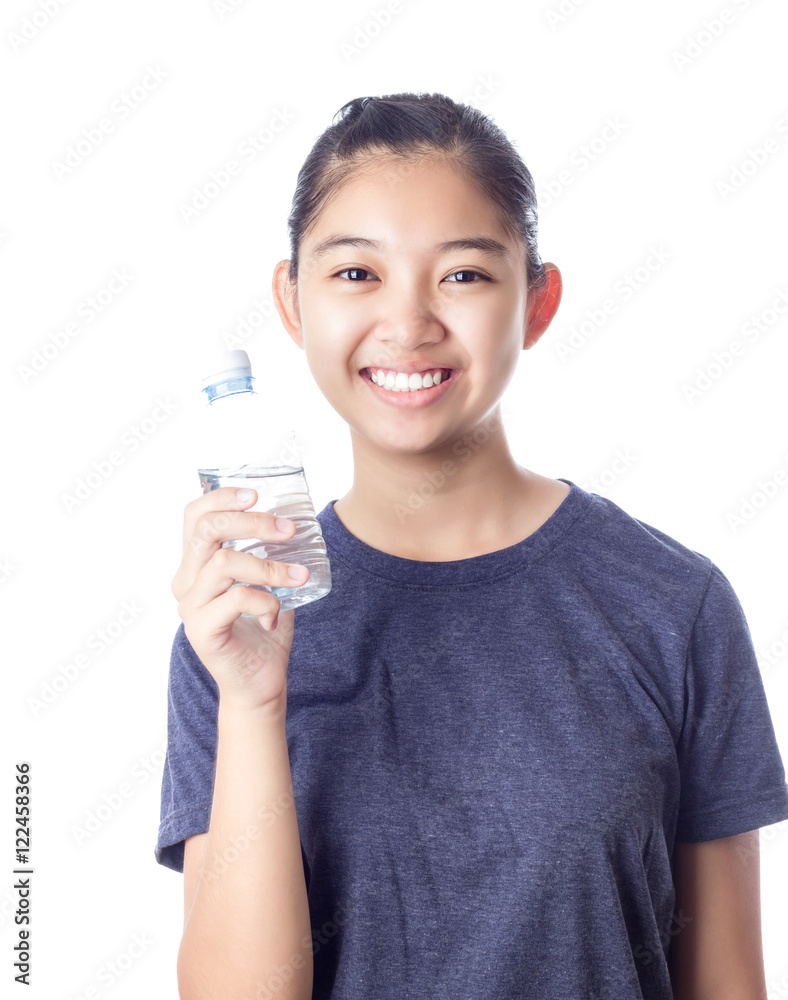 Young happy smiling girl holding a bottle of water Young happy smiling girl holding a bottle of water