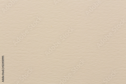 Water-colour paper texture background in light beige tone with v