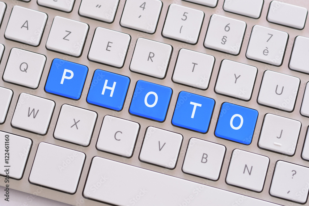 Photo in blue on white keyboard Photo in blue on white keyboard