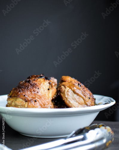 Wallpaper Mural fresh steamy hot basil chicken thighs with a dark backdrop Torontodigital.ca