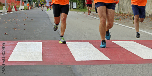 fast runners during a marathon race in the city on a pedestrian