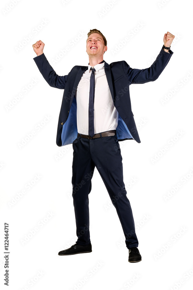 Happy young businessman raised fists isolated on white Happy young businessman raised fists isolated on white