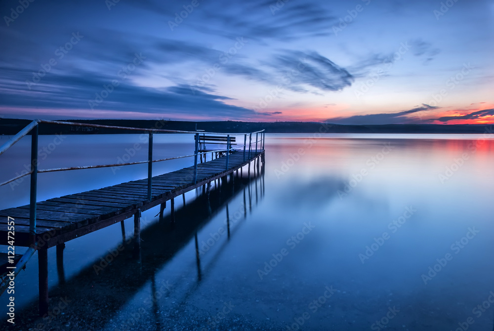 Blue hour. Stunning long exposure sunset on the lake.