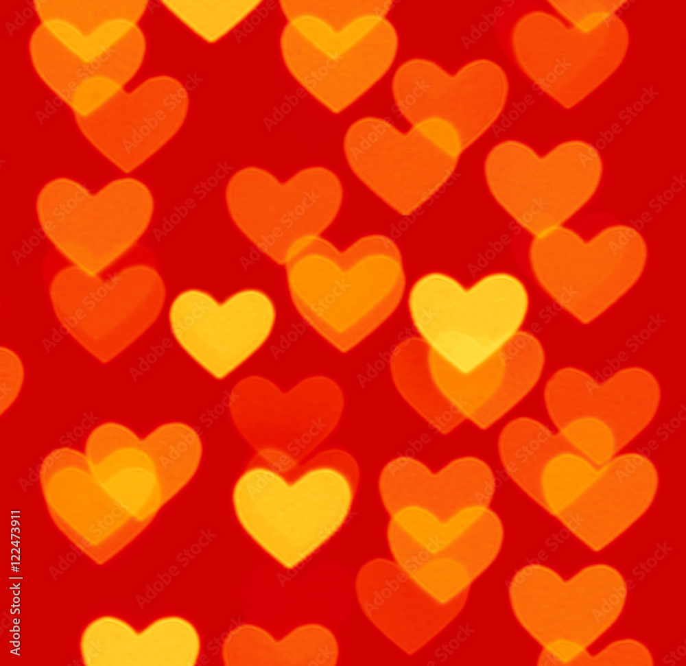 heart bokeh background, photo blurry objects, yellow on red