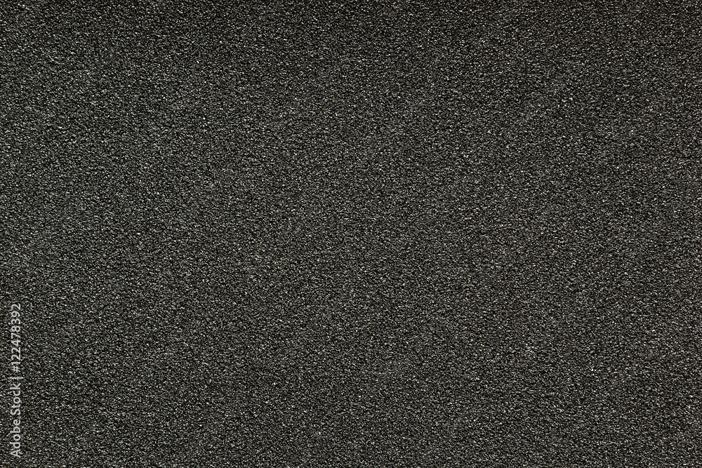 Fototapeta premium Gray monotone grain texture. Glitter sand background.