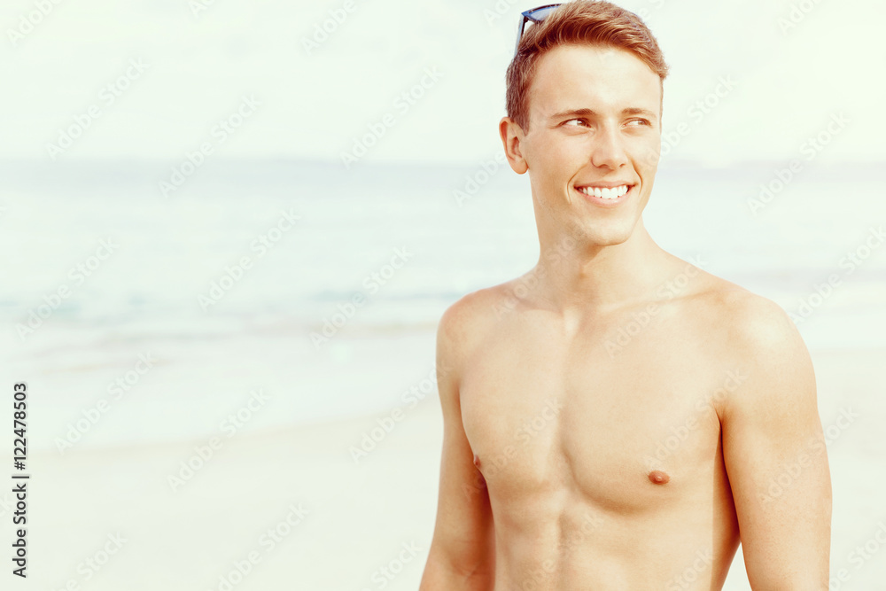 Handsome man posing at beach Handsome man posing at beach