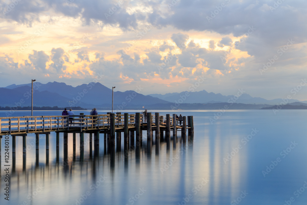 Jetty at Lake Chiemsee in Chieming after sunset, long time expos