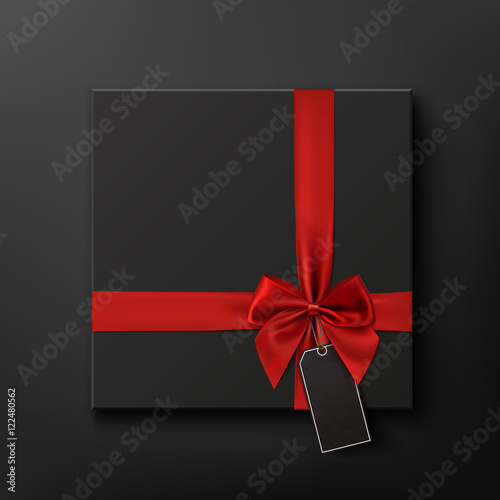 Blank, black gift box with red ribbon and price tag.