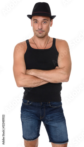 masculine man standing with arms crossed