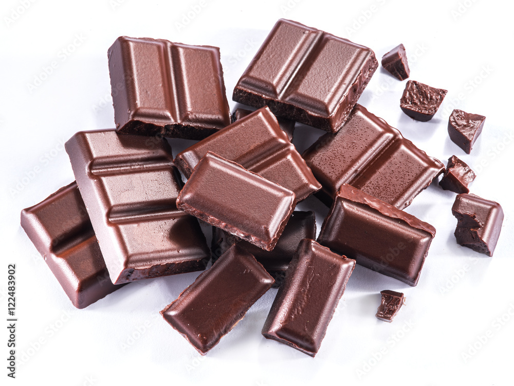Pieces of chocolate bar isolated on a white background. Pieces of chocolate bar isolated on a white background.