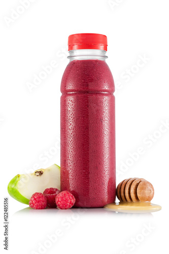 Red smoothie in plastic bottle