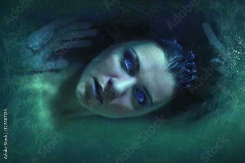 girl lying in the water