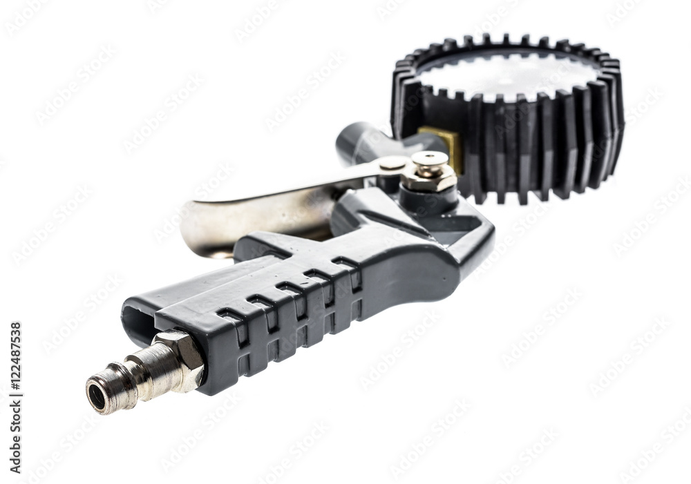 Air compressor gun with manometer isolated on a white background Air compressor gun with manometer isolated on a white background