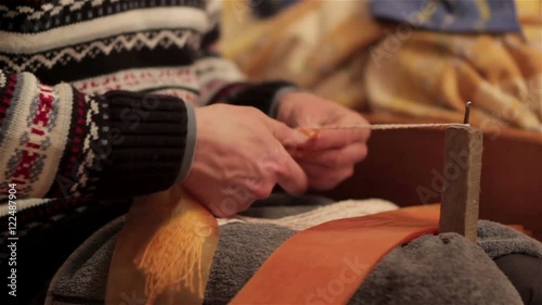 Work butcher hands/people working in the sausage shop hands knitting artificial shell for sausages