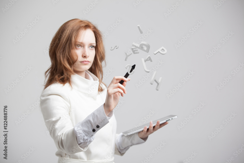 Woman working with a set of letters, writing concept. Woman working with a set of letters, writing concept.